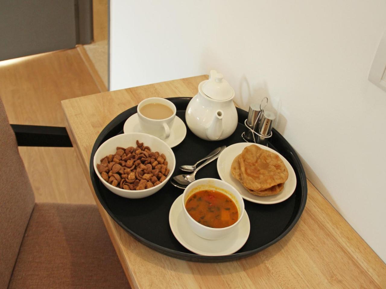 Oyo 13521 Sudhriti Hotel สิริกุรี ภายนอก รูปภาพ